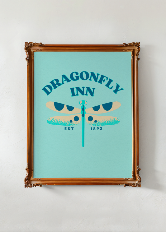 Framed poster with 'Dragonfly Inn' design on a light blue background