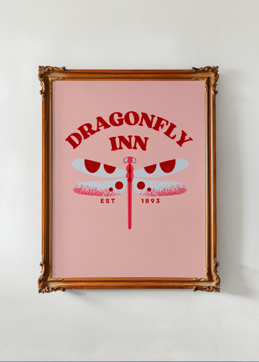 Framed poster with 'Dragonfly Inn' design on a pink background