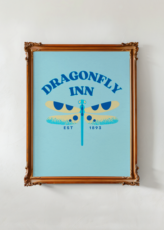 Framed poster with 'Dragonfly Inn' design on a light blue background