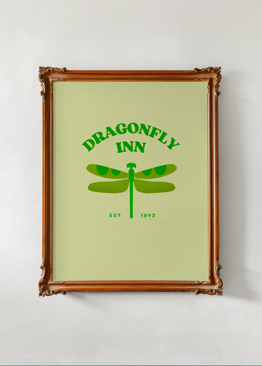 Framed poster with 'Dragonfly Inn' logo on a light green background